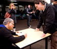 Mind-body expert Deepak Chopra signed books and greeted Kellogg students after a Feb. 8 talk at the Kellogg School.