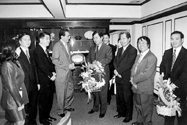 New Finance Minister of Thailand Somkid Jatusripitak '84 (center L). To his left is the former Finance Minister and Kellogg alum Thanong Bidaya '77.