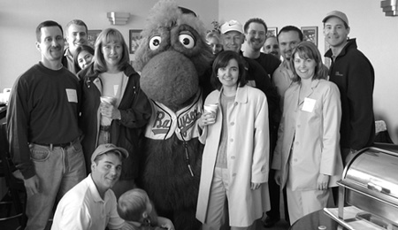 Louie, the Baysox mascot, with DC alums.