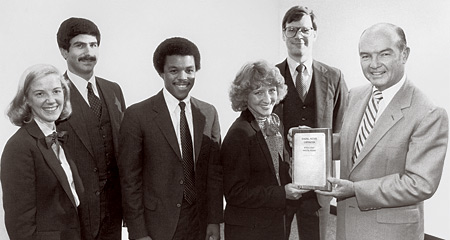 Betsy Holden '82, left, with Kellogg peers after winning the General Motors Marketing Competition in 1982