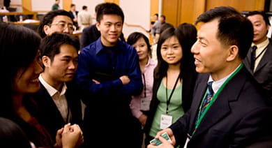 Huagang Zhang, president of Gemdale Corp., with Kellogg students