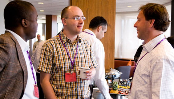 Participants collaborate during breaks between class