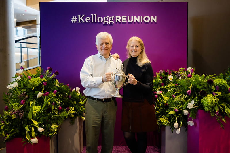 The Class of 1980 Reunion Committee poses in victory with the Reunion Cup