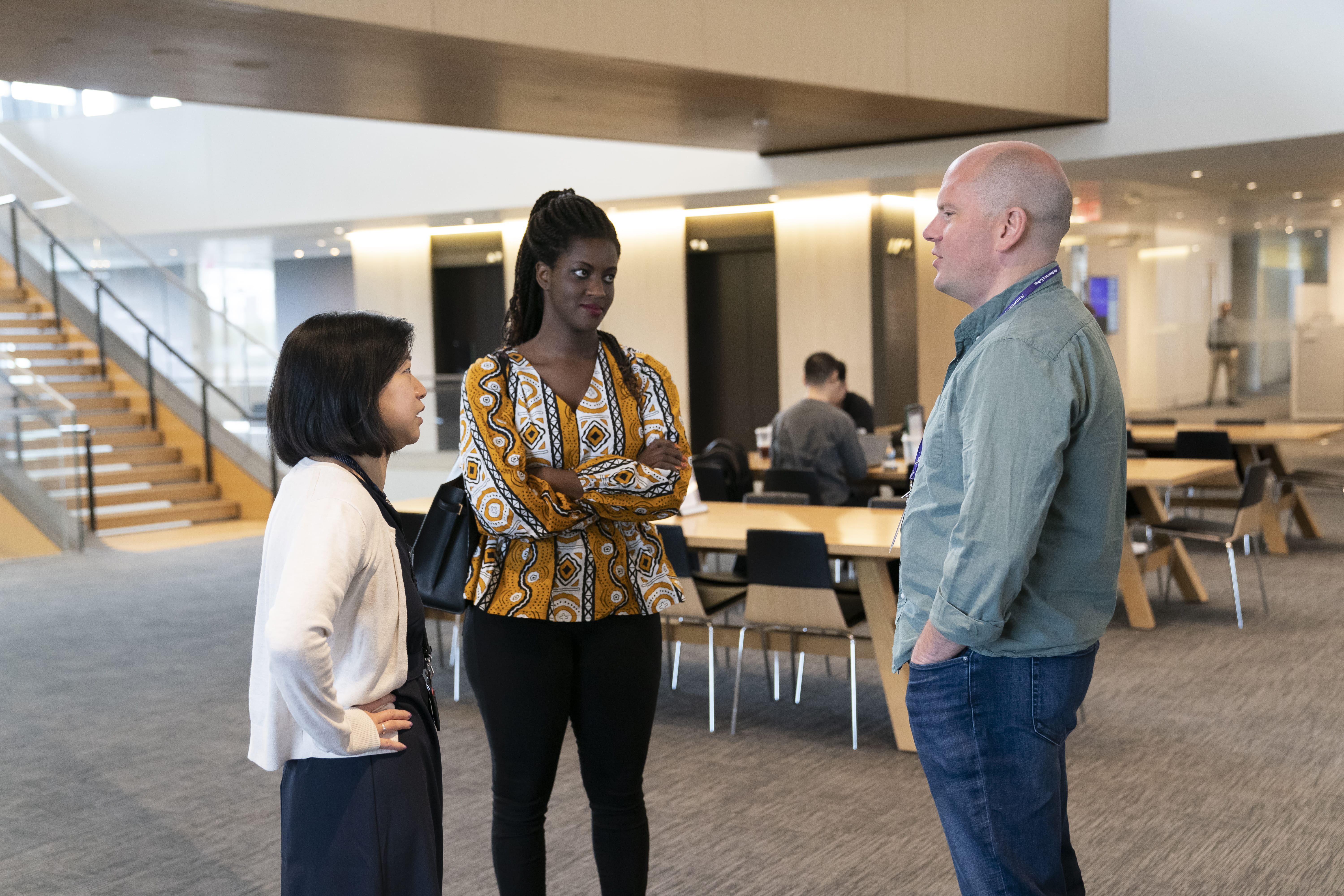 DRRC associates chatting in the Global Hub