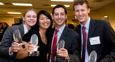 Students pose for a picture after winning the ABI Case competition
