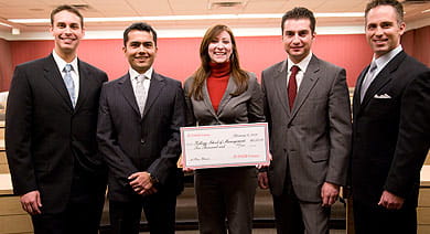 A team from the Part-Time program bested four other Kellogg teams to win the Coca-Cola Channel Reinvention Case Competition. Left to right: Matthew Null, Varun Goyal, Amber Jacoby, Umut Tekin and Keith Maziarek.