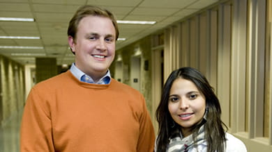 Kellogg students Patrick Gaddie ’12 (left) and Viviane Sales ’12 presented the winning plan at the Neighborhood Business Initiative case competition. 