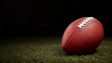 Can a football player's race affect how often he is penalized? Associate Professor Robert Livingston investigates.