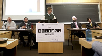 Kellogg Debate participants, from left to right: Klaus Weber, Craig DePriester ’12, moderator David Besanko, Mohan Sawhney and Matthew Gold ’12