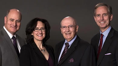 Dean Blount and the honorees. From left: Matt Feldman ’86; Dean Sally Blount ’92; S.C. Johnson & Son Professor of International Marketing Philip Kotler; Matt McCall ’92.