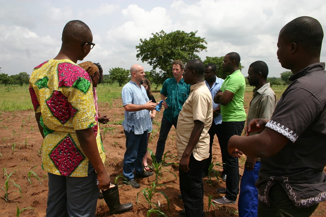 Photo of Dean Karlan and Chris Udry on a Kellogg Global Poverty Research Lab trip to Ghana 