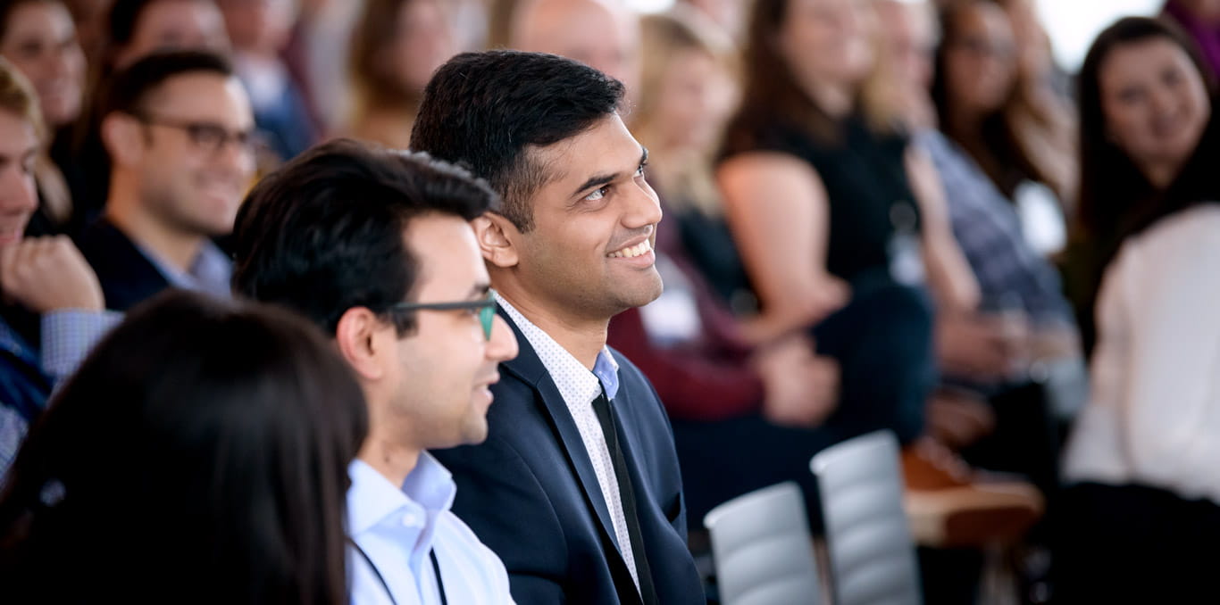 smiling audience members