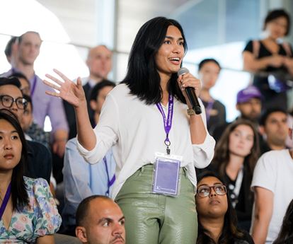 prospective students attending an event at Kellogg's Global Hub