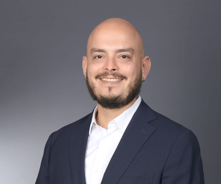 Headshot of Andres Espitia, faculty at the Kellogg School of Management