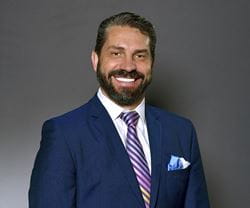 Portrait of Andrew W Sykes, Faculty at the Kellogg School of Management