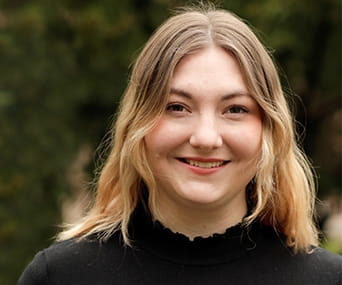 Headshot of Rowan Ellis