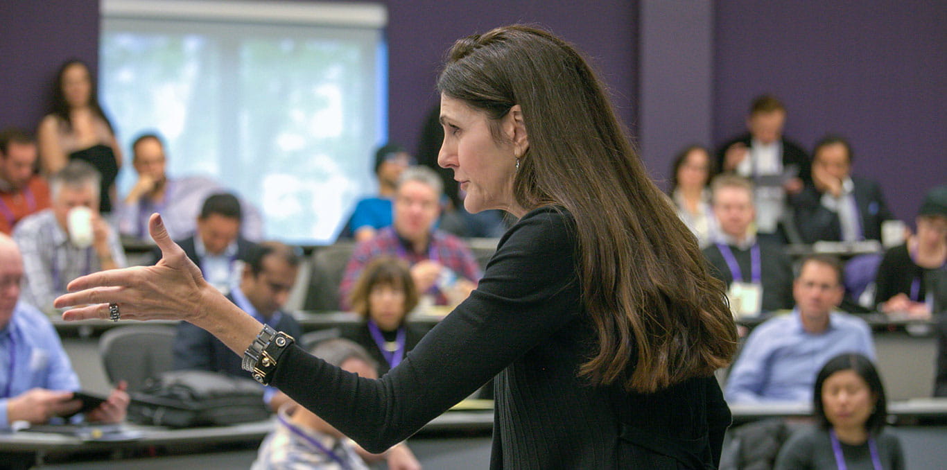 A professor teaches in a lecture hall filled with students at Northwestern University