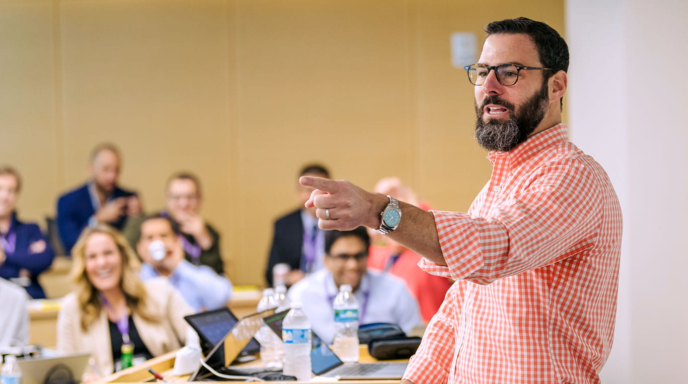 Clinical Professor of Strategy David Schonthal teaches a class in a lecture hall