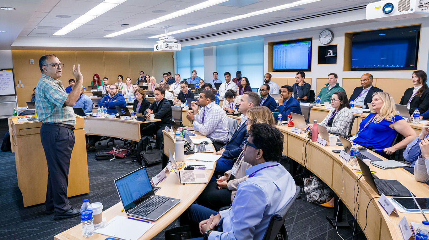 Students sit in class in a small lecture hall on Northwestern University's campus
