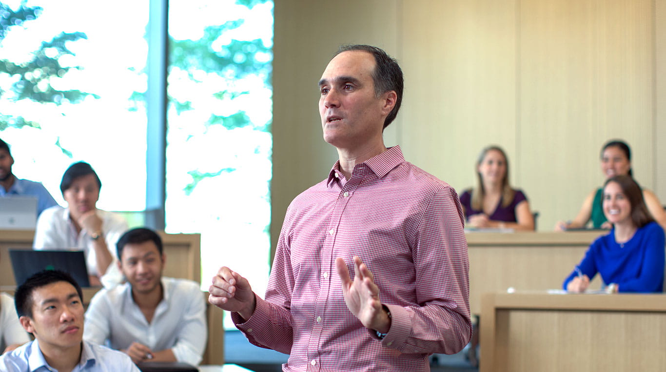 A Kellogg professor speaking during a lecture