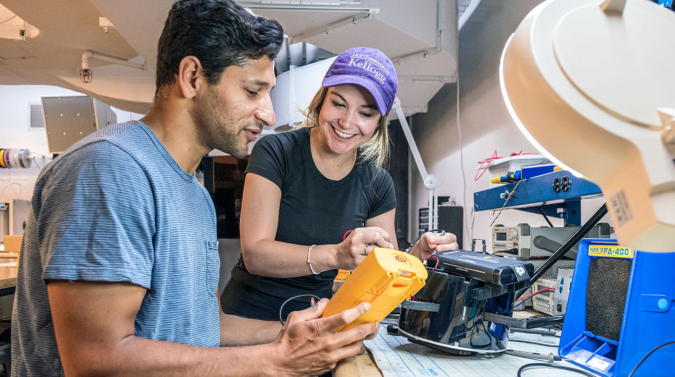 Kellogg students doing lab work