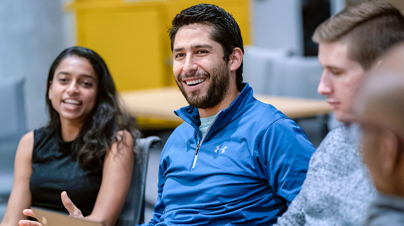 Kellogg students smiling together