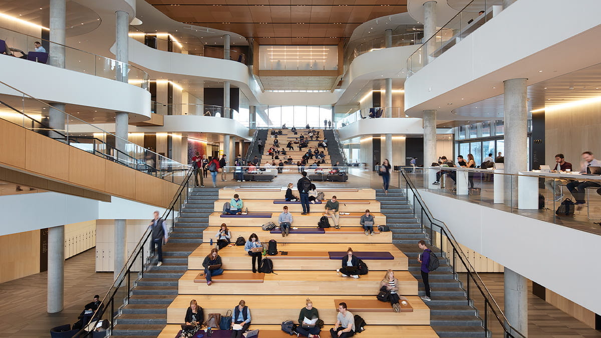Students meeting on the Global Hub stairs