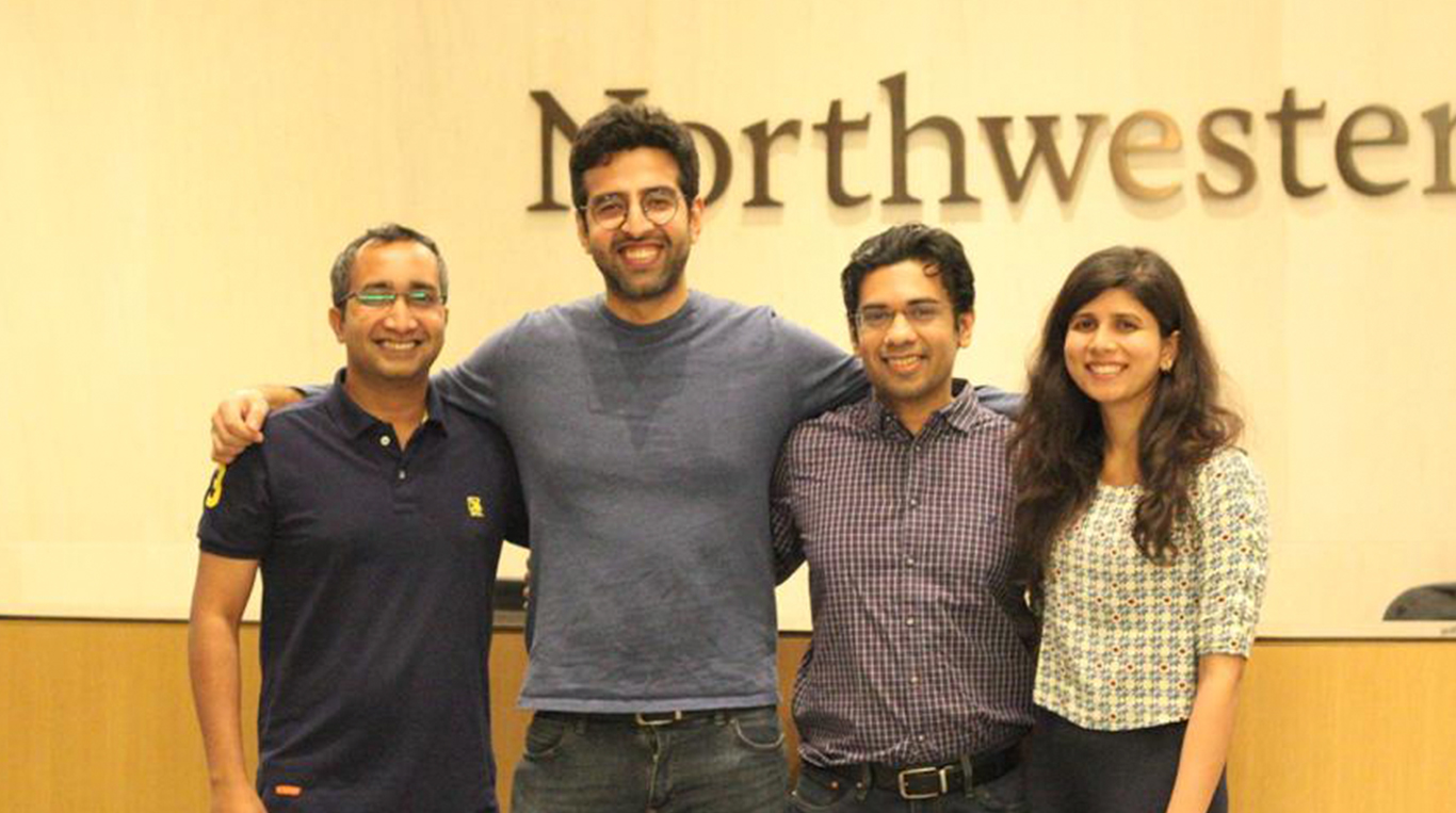 Group photo of four Kellogg students who competed in the Morgan Stanley Sustainable Investment Challenge