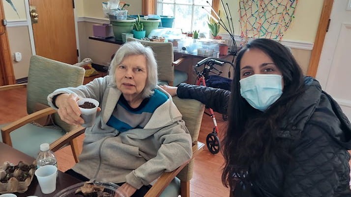 Ava Quail volunteering at a nursing home 