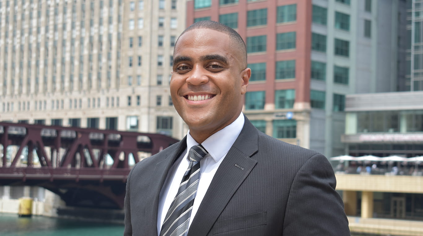 Kellogg MBA student Awuley Quaye '22 pictured in downtown Chicago