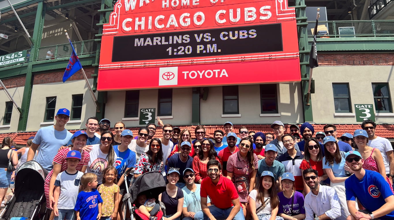 Alejandra Villamil and her Kellogg peers in front of Wrigley Field