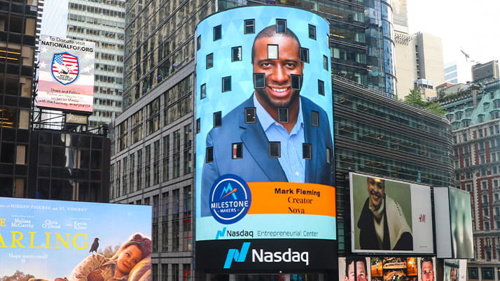 Kellogg graduate Mark Obonna Fleming ’16 MBA featured on the Nasdaq billboard in New York City