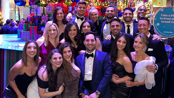 Josh Hribar and his cohort celebrate 2021 Manager's Ball. 