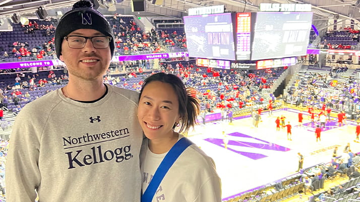 Kellogg couple Kevin and Valerie at a Northwestern basketball game