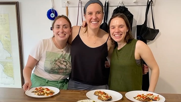 Alena Marovitz ’23 Two -Year MBA with two friends at dinner.