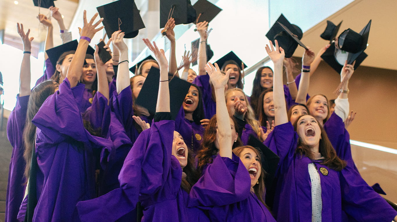 Kellogg graduates celebrating the completion of their MBA journey.