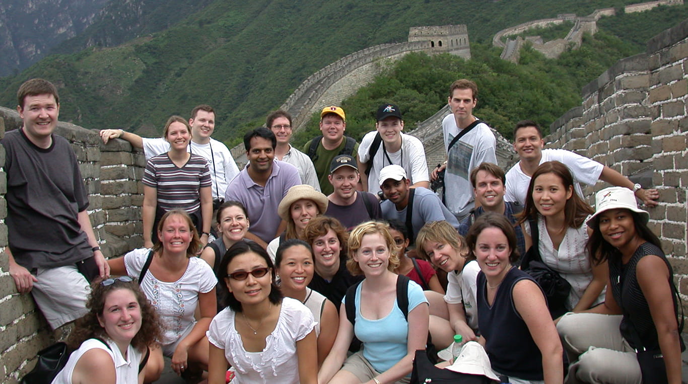 A group of students poses at the Great Wall of China while on a GIM trip in 2003