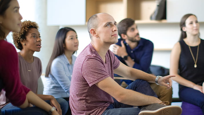 Focused students in the MBAi Program immersed in the vibrant learning environment at Kellogg