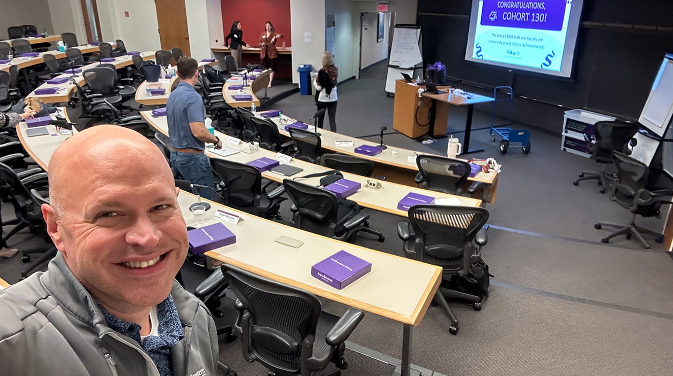 Chris Lugo celebrates the last day of class of his Executive MBA Program at Kellogg.