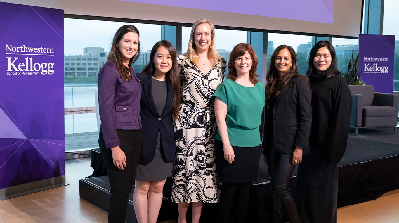Women in Finance event student organizers (left three) and speakers (right three).