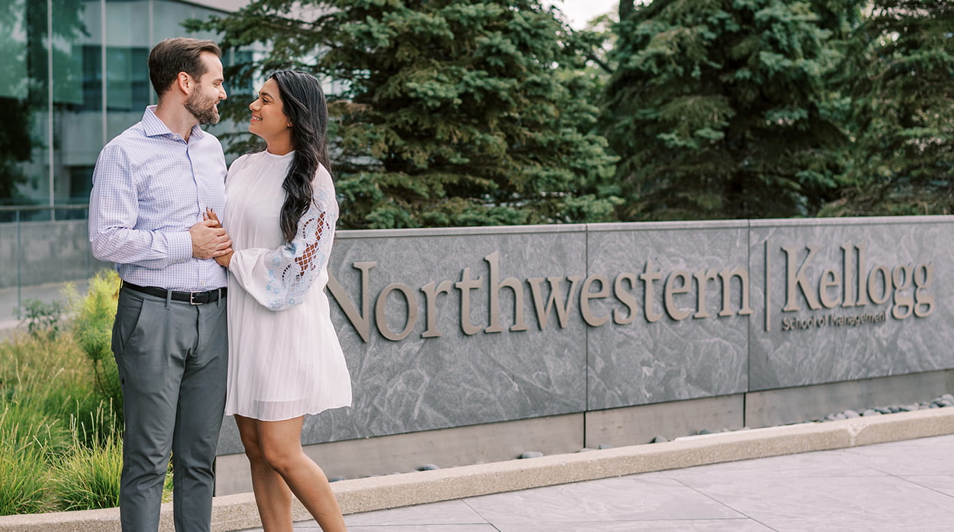 MBA couple Gauri and Mitch celebrate love and success in front of the Global Hub
