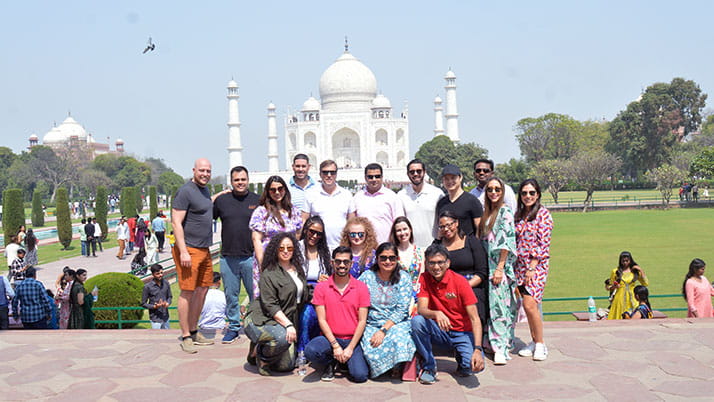A group of students in front of the Taj Mahal