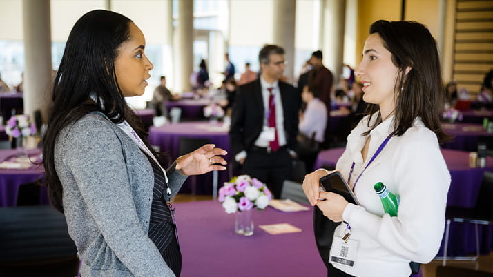 Climate Conference attendees connecting with each other to learn more about their respective career journeys.