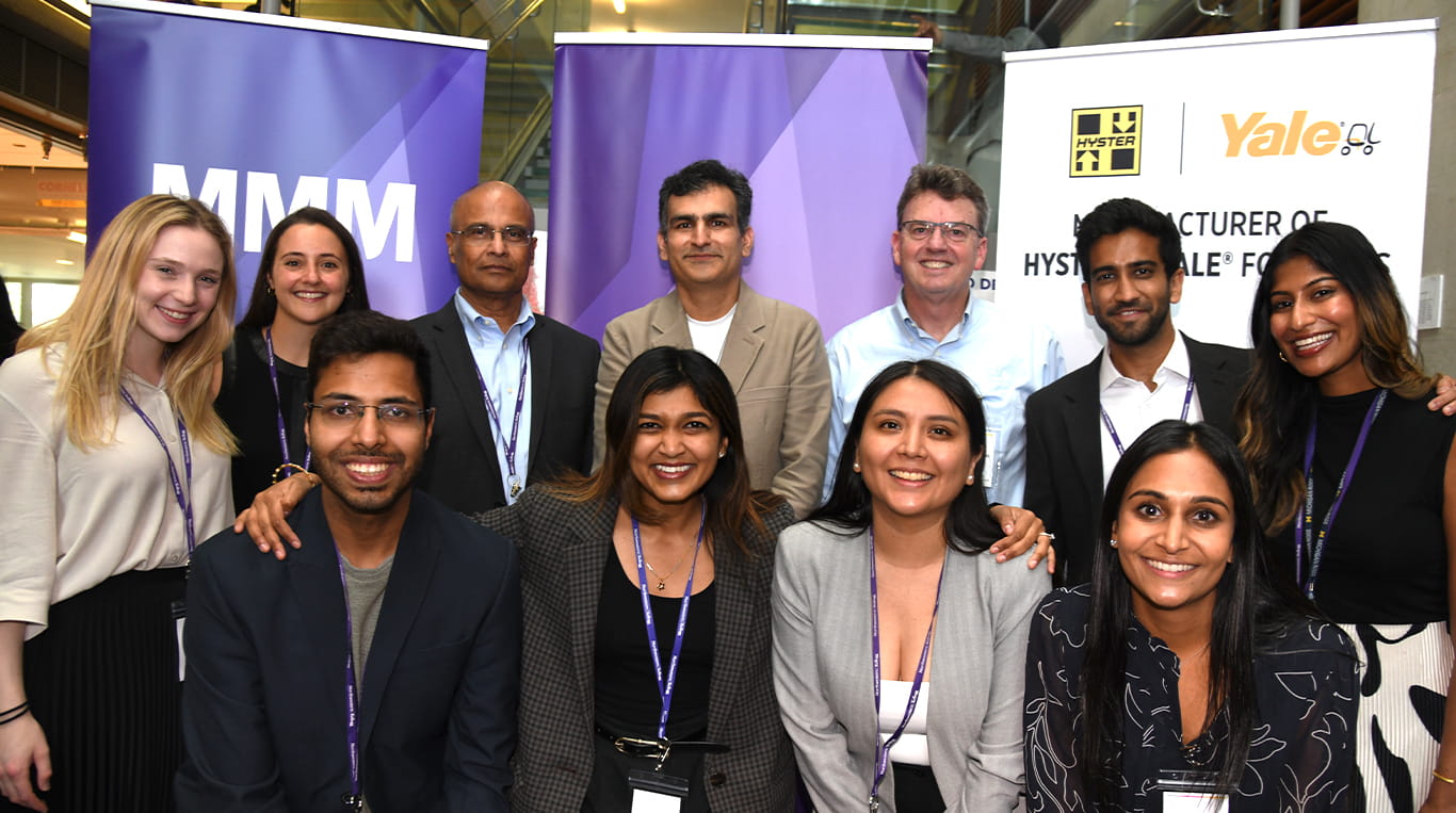 Susan Salinas (middle right, grey blazer) alongside her KDC team members who helped organized this year's challenge.