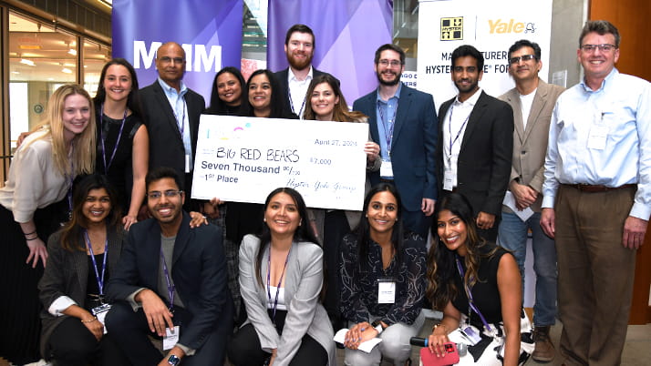 The KDC organizing committee with this year's first place team.