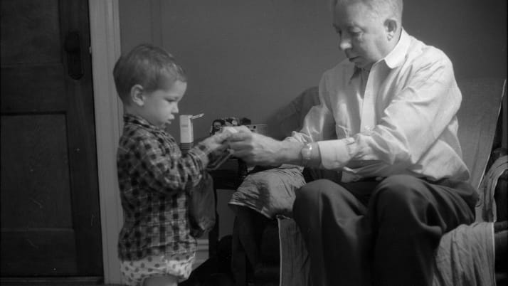 A young Harry Kraemer with his grandfather
