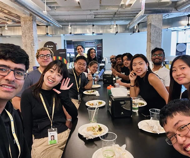 A Kellogg student at a Lunch & Learn during her internship with PayPal and other summer interns