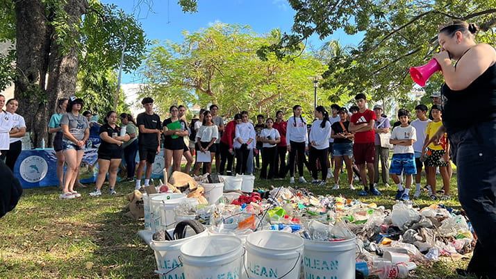 The Miami Kellogg Cares Day volunteer group partnered with Miami Beach to clean Collins Park.