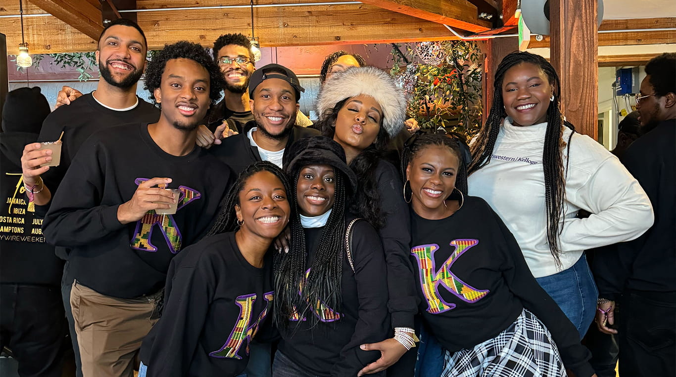 Kellogg JD-MBA student Keatrice Robertson (front center) with her peers during a social outing.