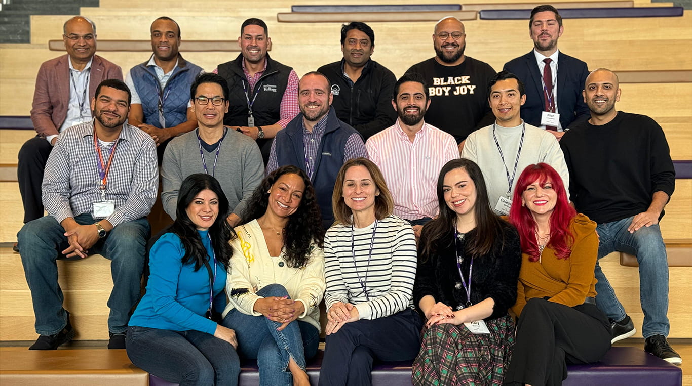 Kaly (first row, second from the right) with other Kellogg EMBA students